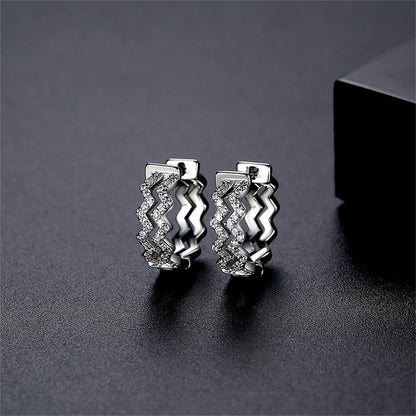 Cubic Zirconia and Silver-Plated Layered Wave Huggie Earrings, silver huggie earrings, elegant gift for her, front view
