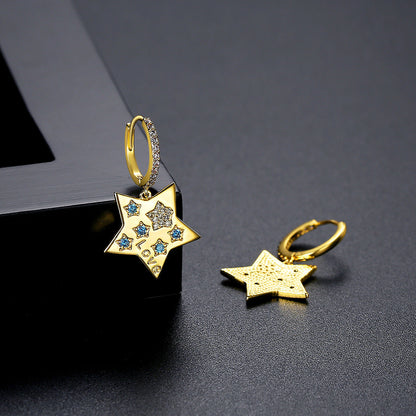 Blue Cubic Zirconia and 18K Gold-Plated Star Huggie Earrings, gold huggie earrings, vintage-inspired design, detail close-up