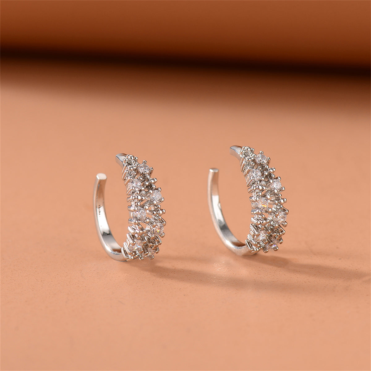 Cubic Zirconia and Silver-Plated Textured Ear Cuffs, silver stud earrings for women, botanical inspired, front view