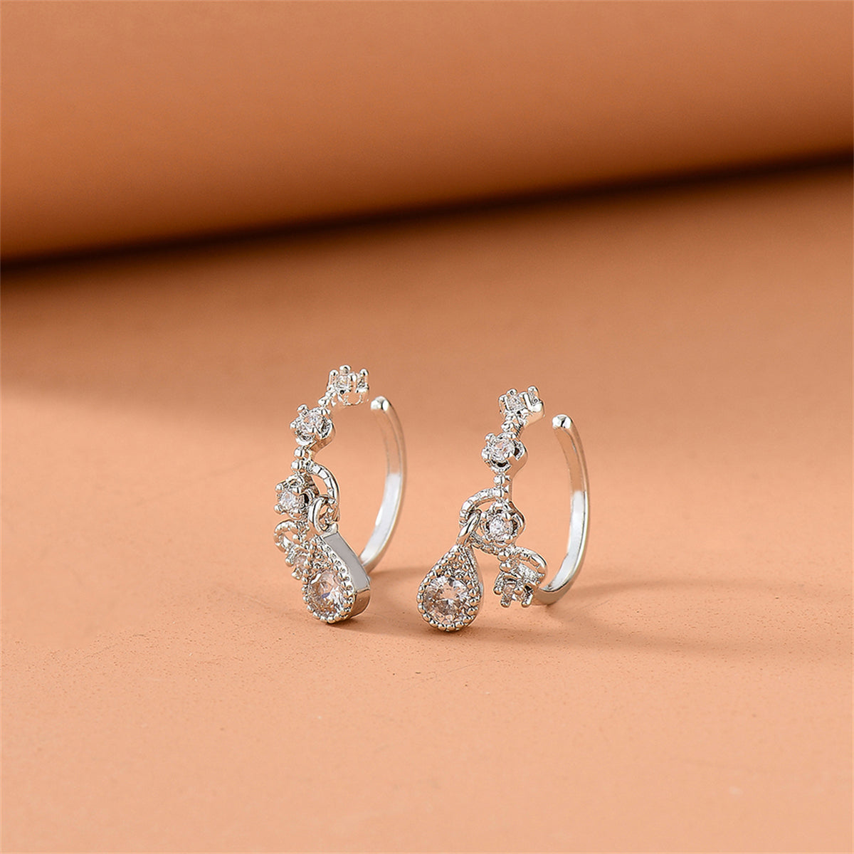 Cubic Zirconia and Silver-Plated Teardrop Dangle Ear Cuffs, silver stud earrings for women, front view