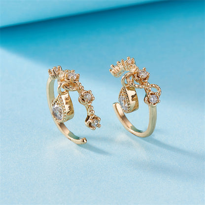 Cubic Zirconia and 18K Gold-Plated Teardrop Ear Cuffs, gold stud earrings for women, botanical inspired, detail close-up