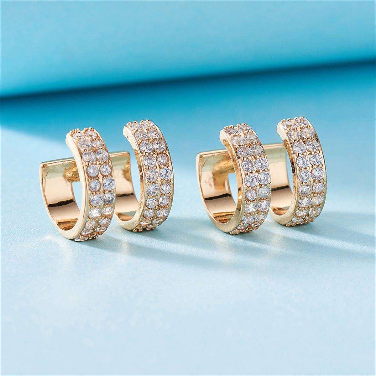Cubic Zirconia and 18K Gold-Plated Layered Ear Cuffs, gold stud earrings for women, botanical inspired, detail close-up