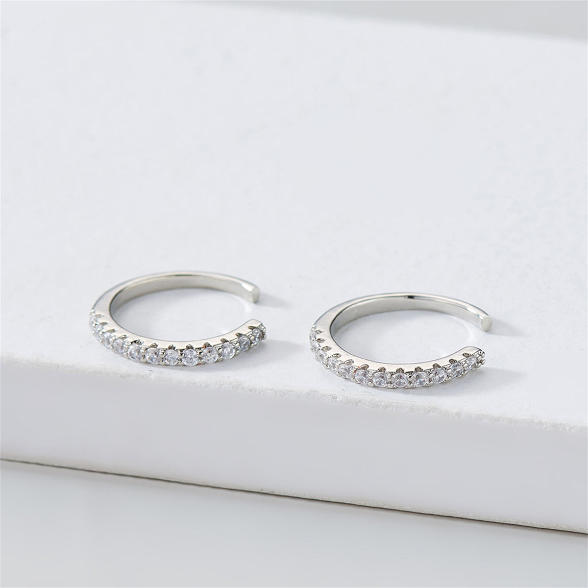 Cubic Zirconia and Silver-Plated Pav¨¦ Ear Cuffs, silver stud earrings for women, botanical inspired, detail close-up