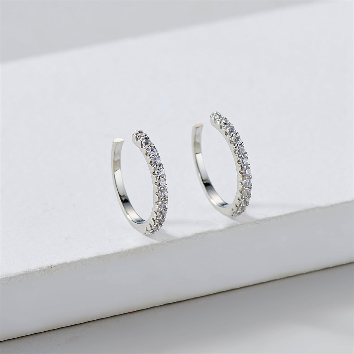 Cubic Zirconia and Silver-Plated Pav¨¦ Ear Cuffs, silver stud earrings for women, botanical inspired, styled look