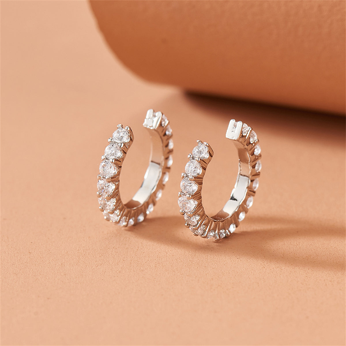 Cubic Zirconia and Silver-Plated Ear Cuffs, silver stud earrings for women, botanical inspired, detail close-up