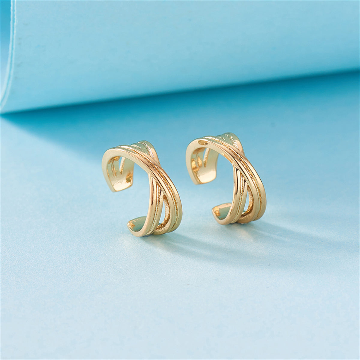 18K Gold-Plated Crossing Stacked Line Ear Cuffs, gold hoop earrings for women, botanical inspired, front view