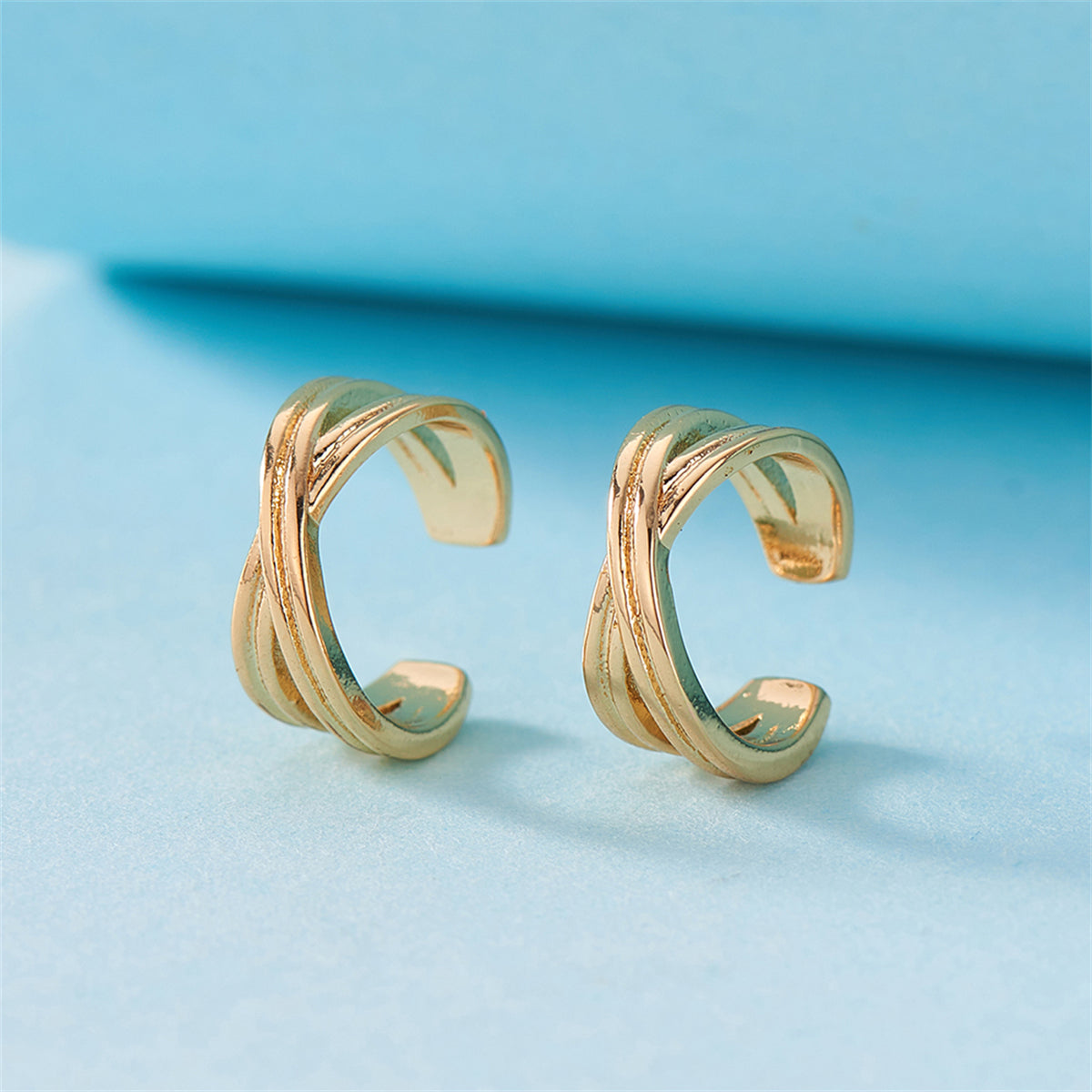 18K Gold-Plated Crossing Stacked Line Ear Cuffs, gold hoop earrings for women, botanical inspired, detail close-up