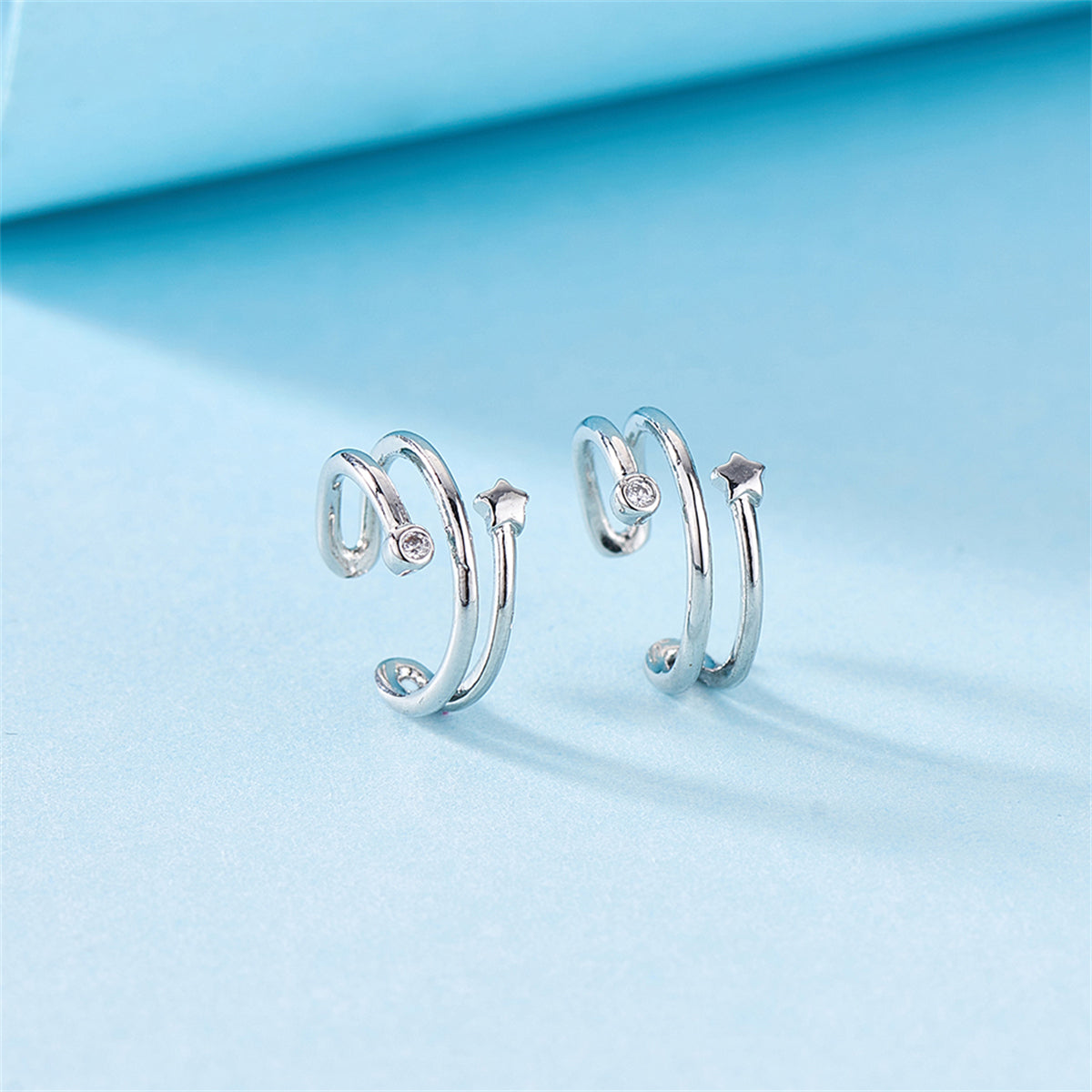 Cubic Zirconia and Silver-Plated Star Ear Cuffs, silver stud earrings for women, everyday style, detail close-up