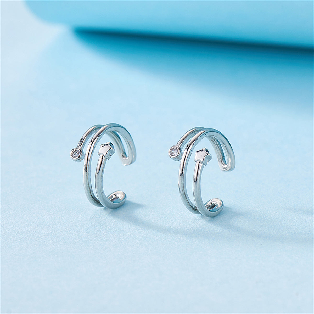 Cubic Zirconia and Silver-Plated Star Ear Cuffs, silver stud earrings for women, everyday style, styled look