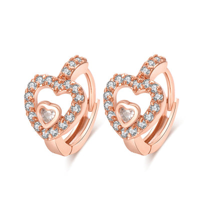 Cubic Zirconia and 18K Rose Gold-Plated Heart Huggie Earrings, rose gold huggie earrings, everyday style, side view