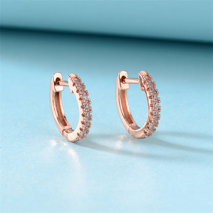 Cubic Zirconia and 18K Rose Gold-Plated Huggie Earring, rose gold huggie earrings, botanical inspired, detail close-up
