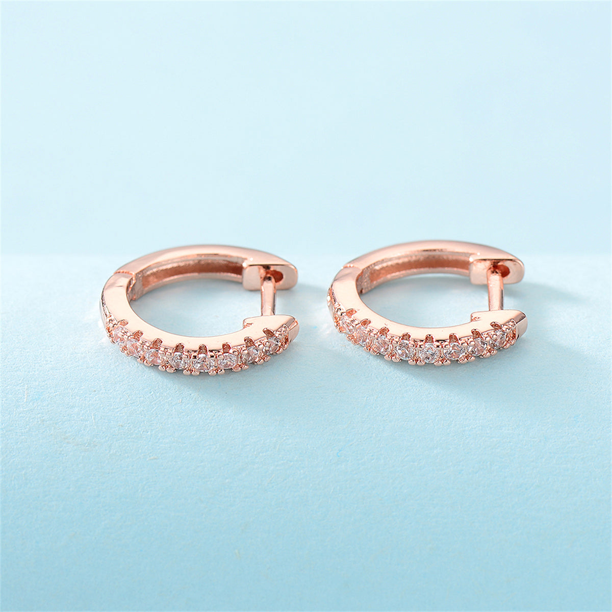 Cubic Zirconia and 18K Rose Gold-Plated Huggie Earring, rose gold huggie earrings, botanical inspired, lifestyle look