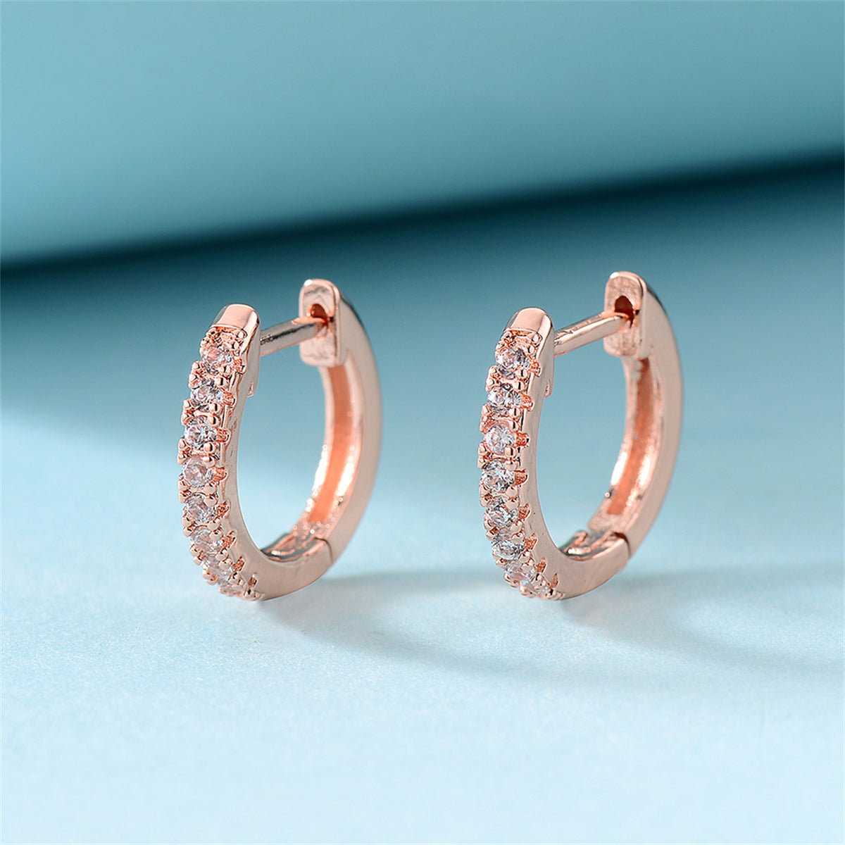 Cubic Zirconia and 18K Rose Gold-Plated Huggie Earring, rose gold huggie earrings, botanical inspired, side view