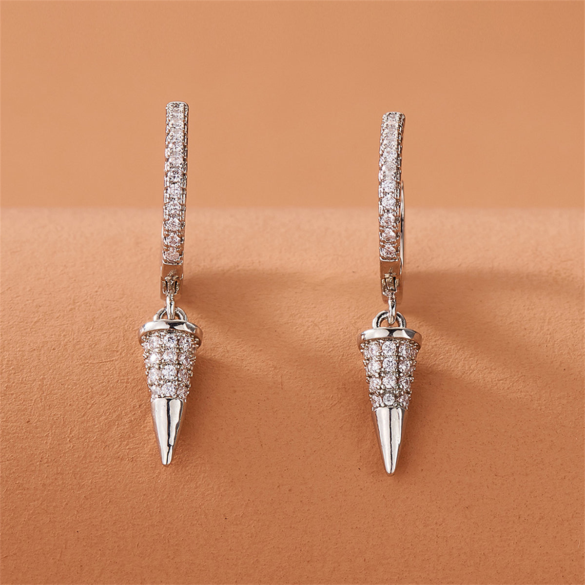 Cubic Zirconia and Silver-Plated Awl Huggie Earring, silver huggie earrings, vintage-inspired design, detail close-up