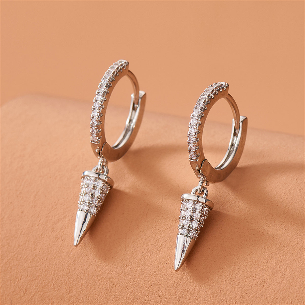 Cubic Zirconia and Silver-Plated Awl Huggie Earring, silver huggie earrings, vintage-inspired design, lifestyle look