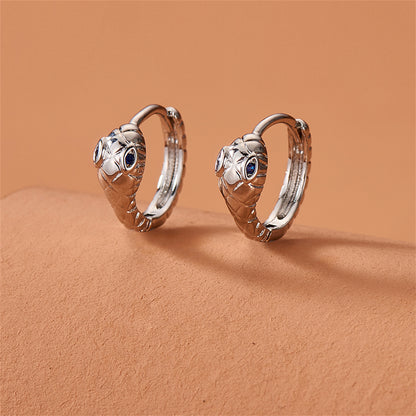 Blue Cubic Zirconia and Silver-Plated Snake Huggie Earrings, silver huggie earrings, dainty minimalist design, front view