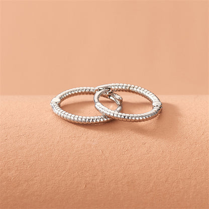 Silver-Plated Twine Huggie Earrings, silver huggie earrings, vintage-inspired design, detail close-up