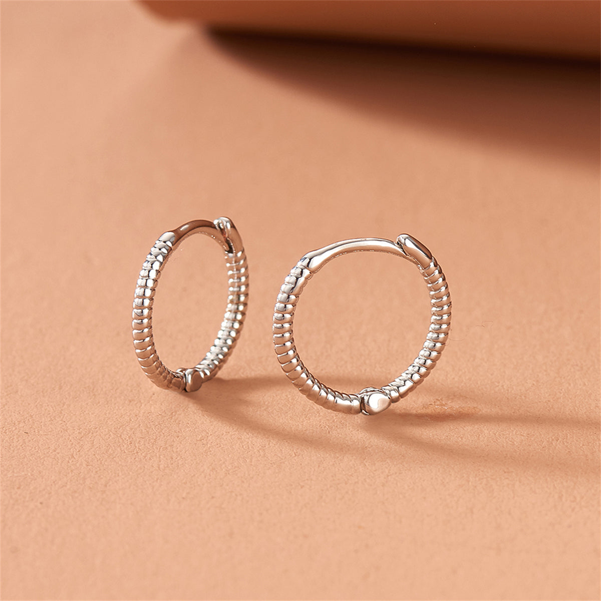 Silver-Plated Twine Huggie Earrings, silver huggie earrings, vintage-inspired design, lifestyle look