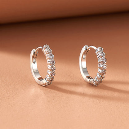 Cubic Zirconia and Silver-Plated Bezel Huggie Earrings, silver huggie earrings, everyday style, side view