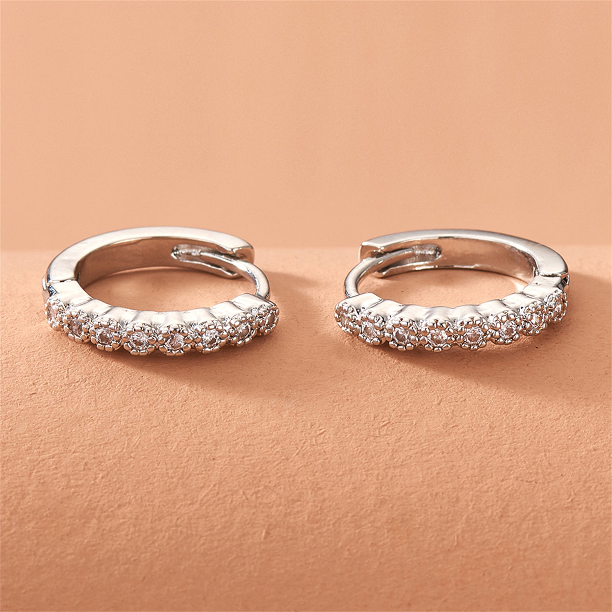 Cubic Zirconia and Silver-Plated Bezel Huggie Earrings, silver huggie earrings, everyday style, lifestyle look