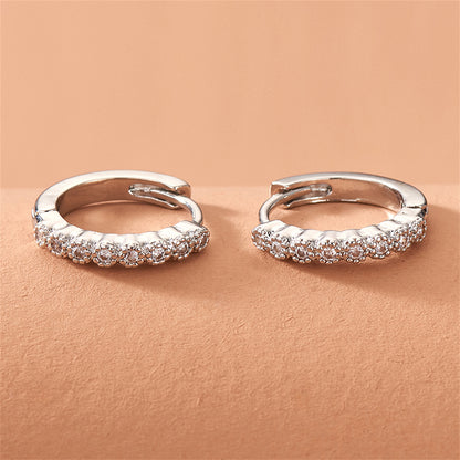 Cubic Zirconia and Silver-Plated Bezel Huggie Earrings, silver huggie earrings, everyday style, lifestyle look