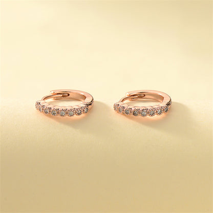Cubic Zirconia and 18K Rose Gold-Plated Bezel Huggie Earrings, rose gold huggie earrings, everyday style, side view