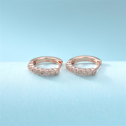 Cubic Zirconia and 18K Rose Gold-Plated Bezel Huggie Earrings, rose gold huggie earrings, everyday style, lifestyle look