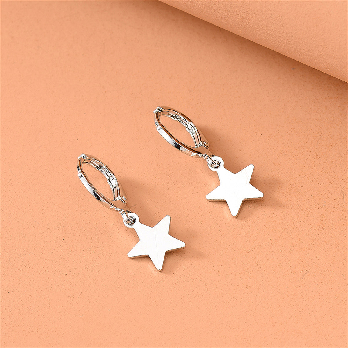 Silver-Plated Star Huggie Earrings, silver huggie earrings, elegant gift for her, detail close-up