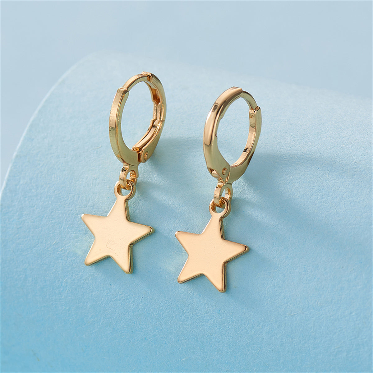 18K Gold-Plated Star Huggie Earrings, gold huggie earrings, botanical inspired, side view