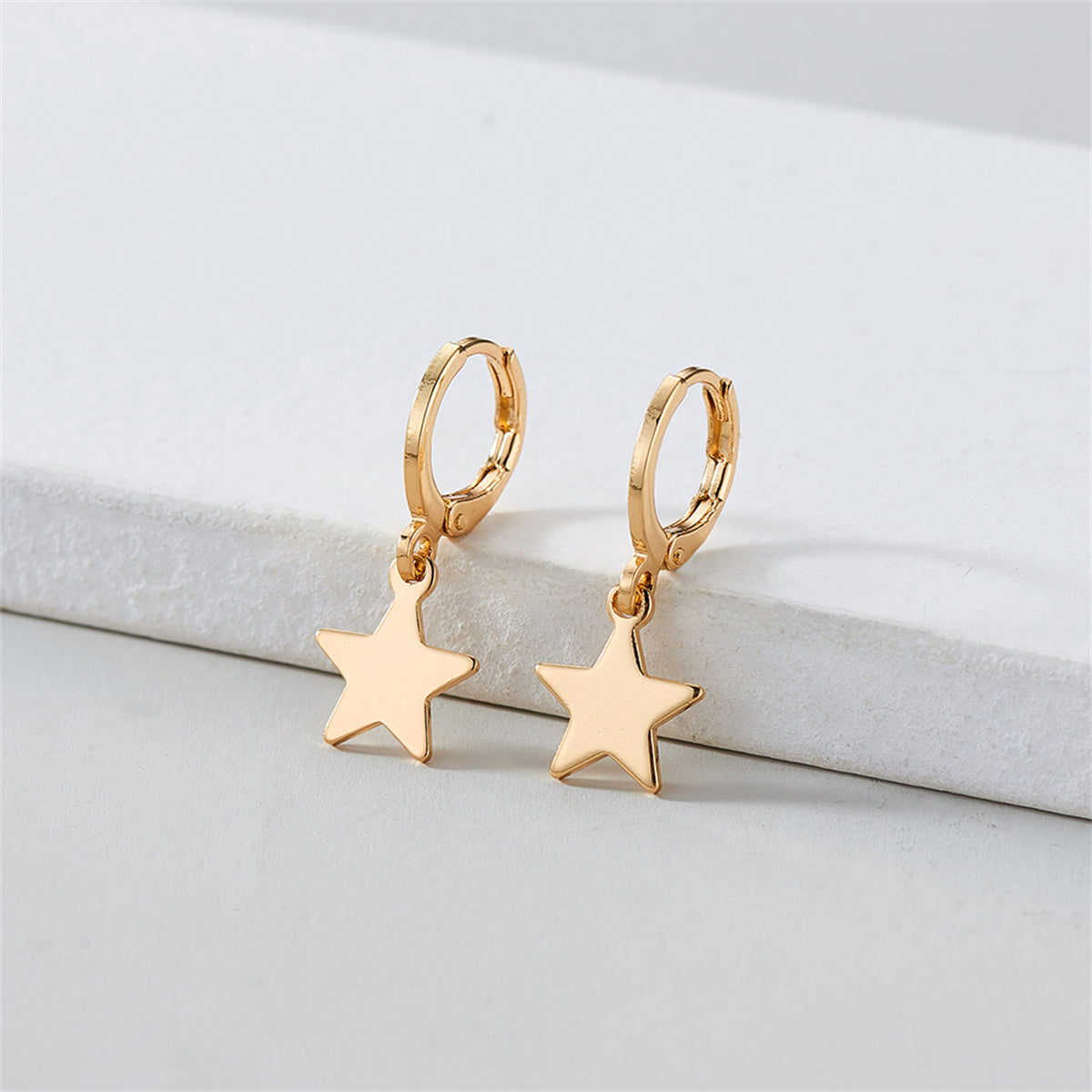 18K Gold-Plated Star Huggie Earrings, gold huggie earrings, botanical inspired, detail close-up