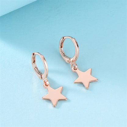 18K Rose Gold-Plated Star Huggie Earrings, rose gold huggie earrings, vintage-inspired design, detail close-up