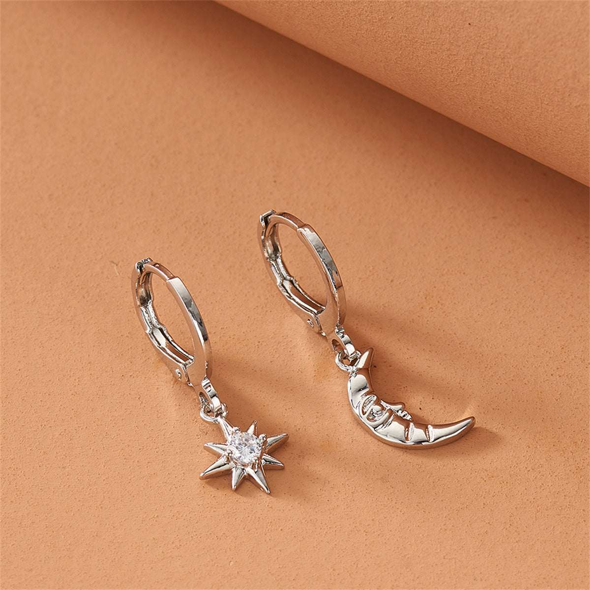 Cubic Zirconia and Silver-Plated Sun and Moon Asymmetrical Huggie Earrings, silver huggie earrings, styled look
