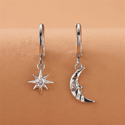 Cubic Zirconia and Silver-Plated Sun and Moon Asymmetrical Huggie Earrings, silver huggie earrings, front view