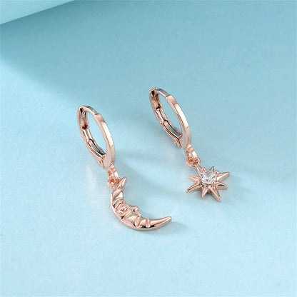 Cubic Zirconia and 18K Rose Gold-Plated Sun Moon Huggie Earrings, rose gold huggie earrings, everyday style, side view