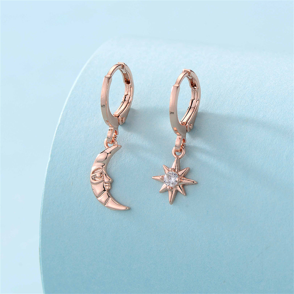 Cubic Zirconia and 18K Rose Gold-Plated Sun Moon Huggie Earrings, rose gold huggie earrings, everyday style, front view