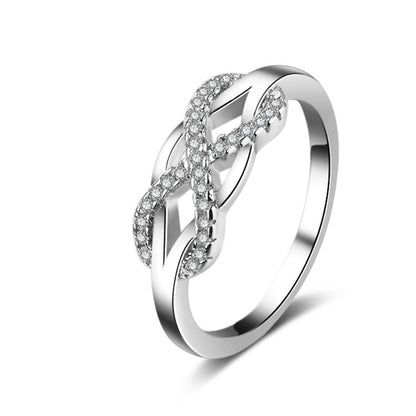 Cubic Zirconia and Silver-Plated Infinity Ring, silver statement rings for women, dainty minimalist design, front view
