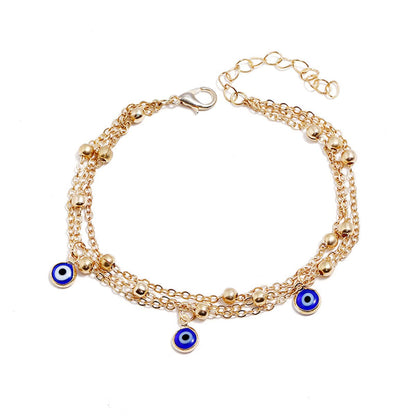 Enamel and 18K Gold-Plated Eye Layered Anklet, gold anklet bracelet, dainty minimalist design, side view