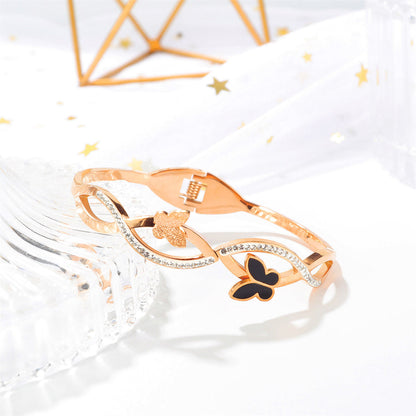 Cubic Zirconia and Black Acrylic 18K Rose Gold-Plated Frosted Butterfly Wave Bangle, rose gold bangle..., detail close-up