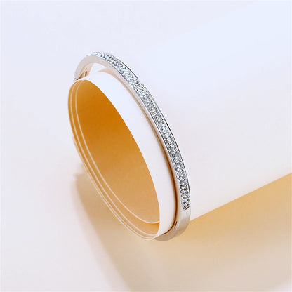 Clear Cubic Zirconia and Silver-Plated Hinged Bangle, silver bangle bracelet, vintage-inspired design, detail close-up
