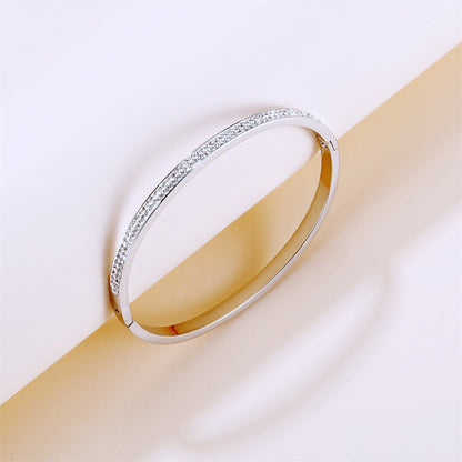 Clear Cubic Zirconia and Silver-Plated Hinged Bangle, silver bangle bracelet, vintage-inspired design, side view