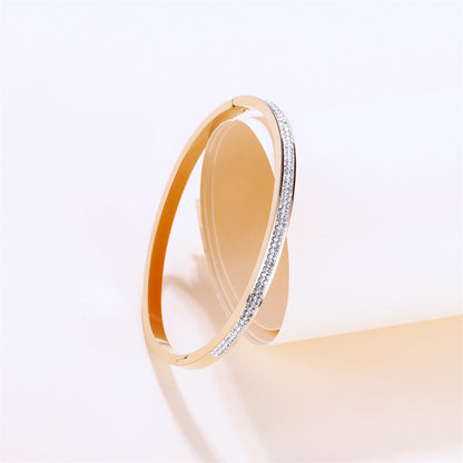 Clear Cubic Zirconia and 18K Rose Gold-Plated Hinged Bangle, rose gold bangle bracelet, vintage-inspired design, side view