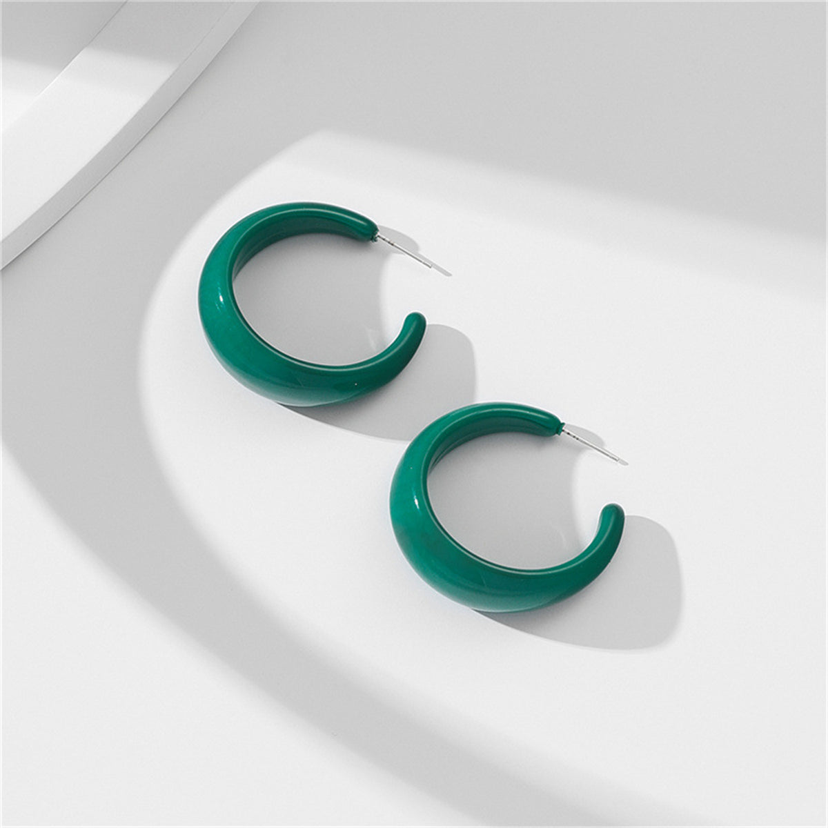 Dark Green Resin and Silver-Plated Open Hoop Earrings, botanical inspired, front view