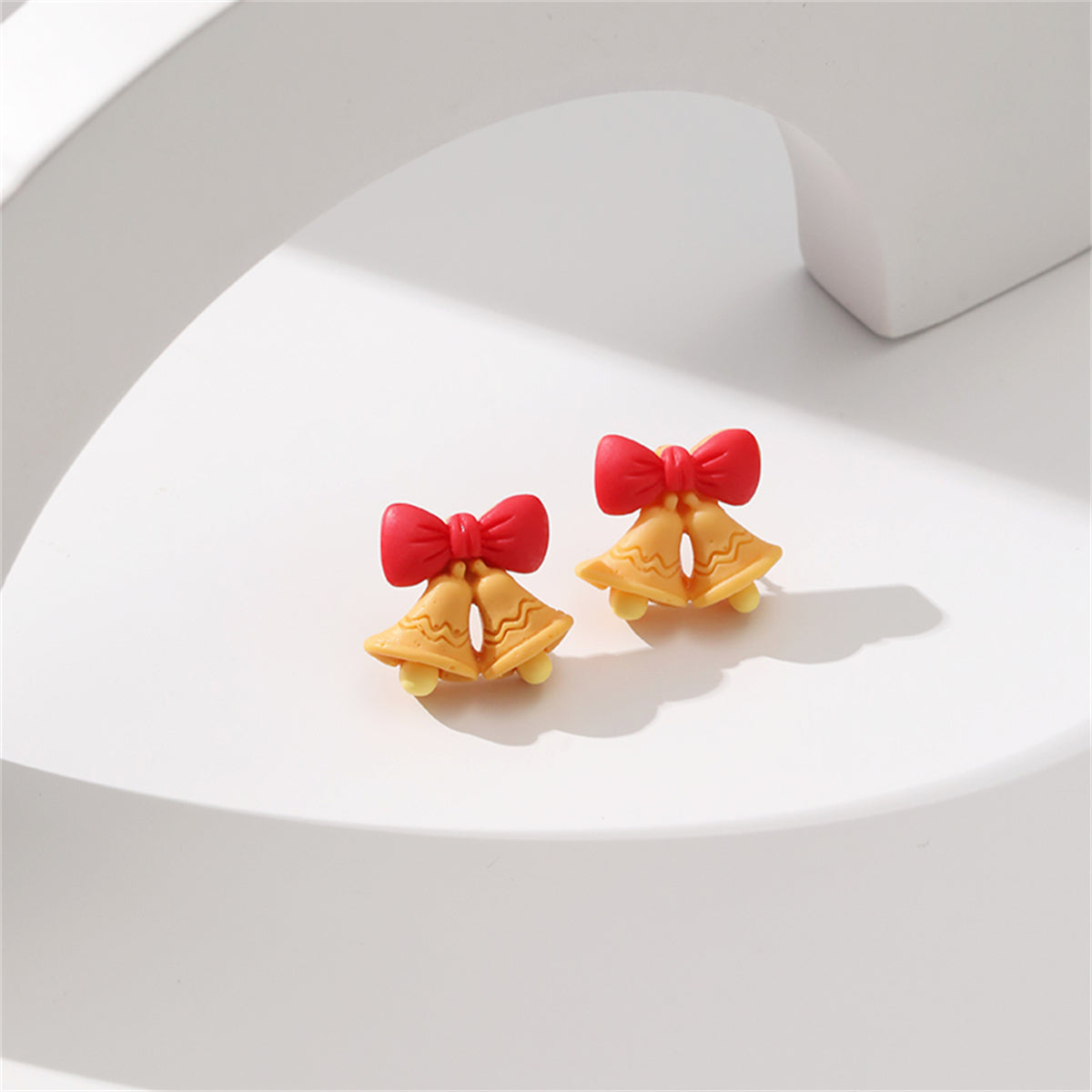 Red Resin and Silver-Plated Bow Bell Stud Earrings, silver stud earrings for women, botanical inspired, lifestyle look