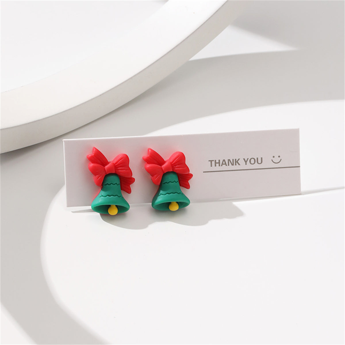Green and Red Resin Silver-Plated Bow Bell Stud Earrings, silver stud earrings for women, dainty minimalist design, side view