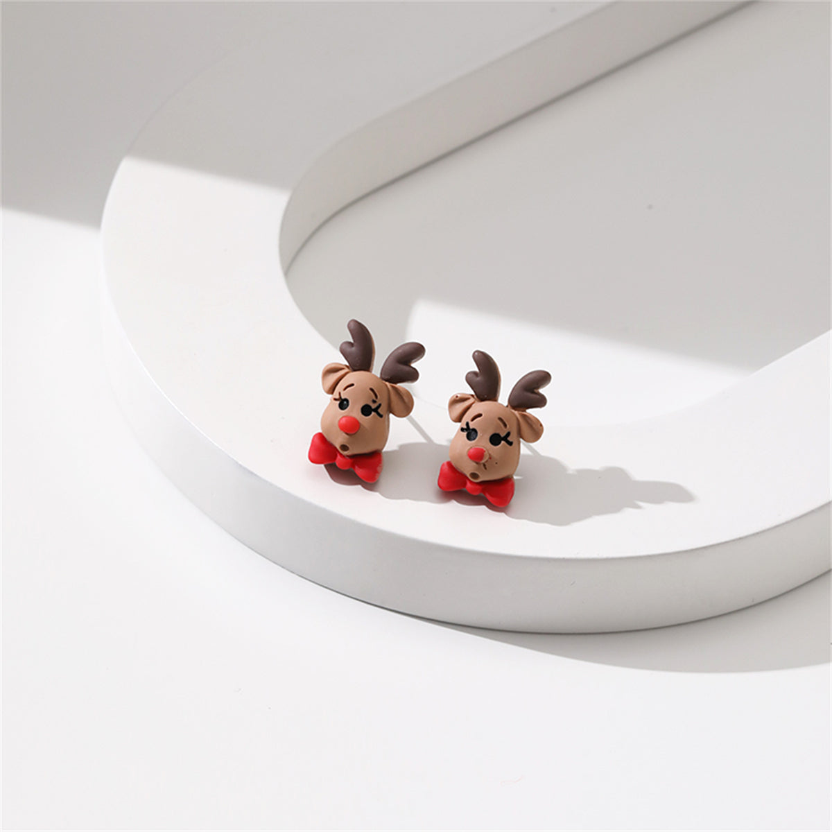 Green and Red Resin Silver-Plated Reindeer Bow Stud Earrings, silver stud earrings for women, front view