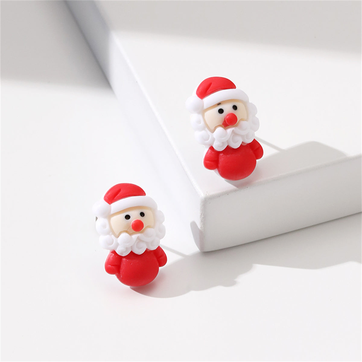Red and White Resin Silver-Plated Santa Stud Earrings, silver stud earrings for women, vintage-inspired design, side view