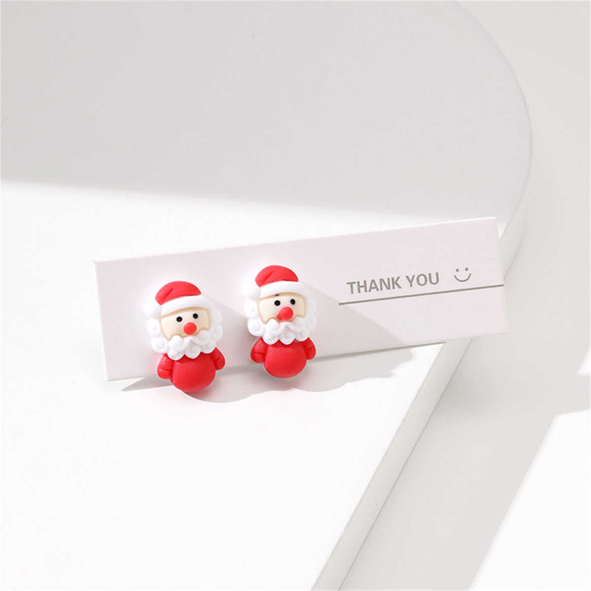 Red and White Resin Silver-Plated Santa Stud Earrings, silver stud earrings for women, vintage-inspired design, front view