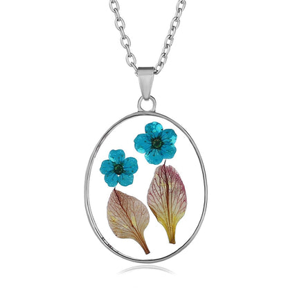 Blue and Green Pressed Flower Oval Pendant Necklace, pendant necklace for women, botanical inspired, side view