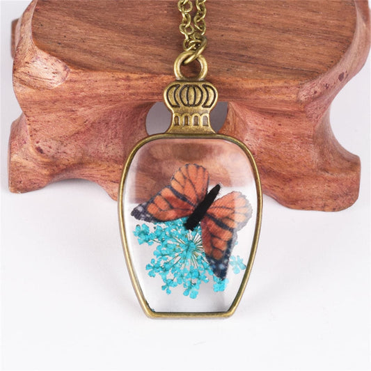 Dark Blue Gypsophila and 18K Gold-Plated Butterfly Vase Pendant Necklace, gold pendant necklace for women, front view