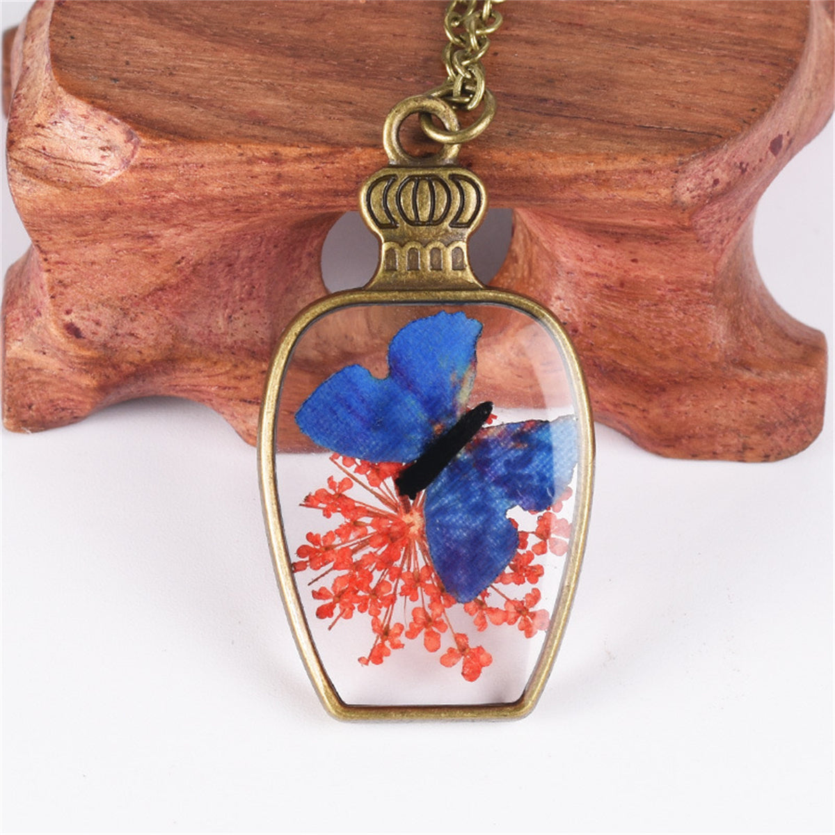 Orange Gypsophila and Blue Butterfly Vase Pendant Necklace, pendant necklace for women, vintage-inspired design, front view